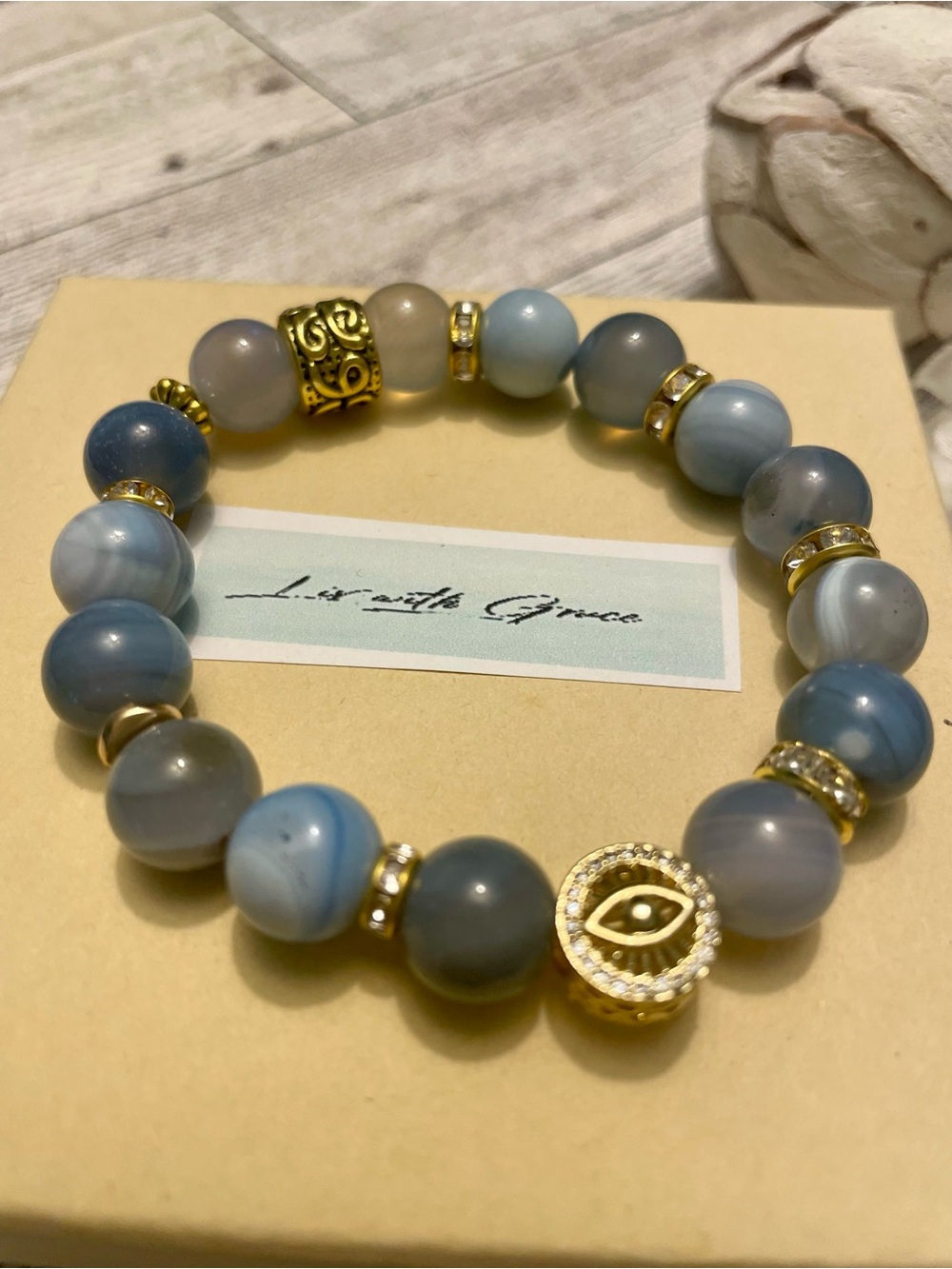 Blue Marbled Agate with Gold Evil Eye in line Charm 10mm cz accents stretch gold
